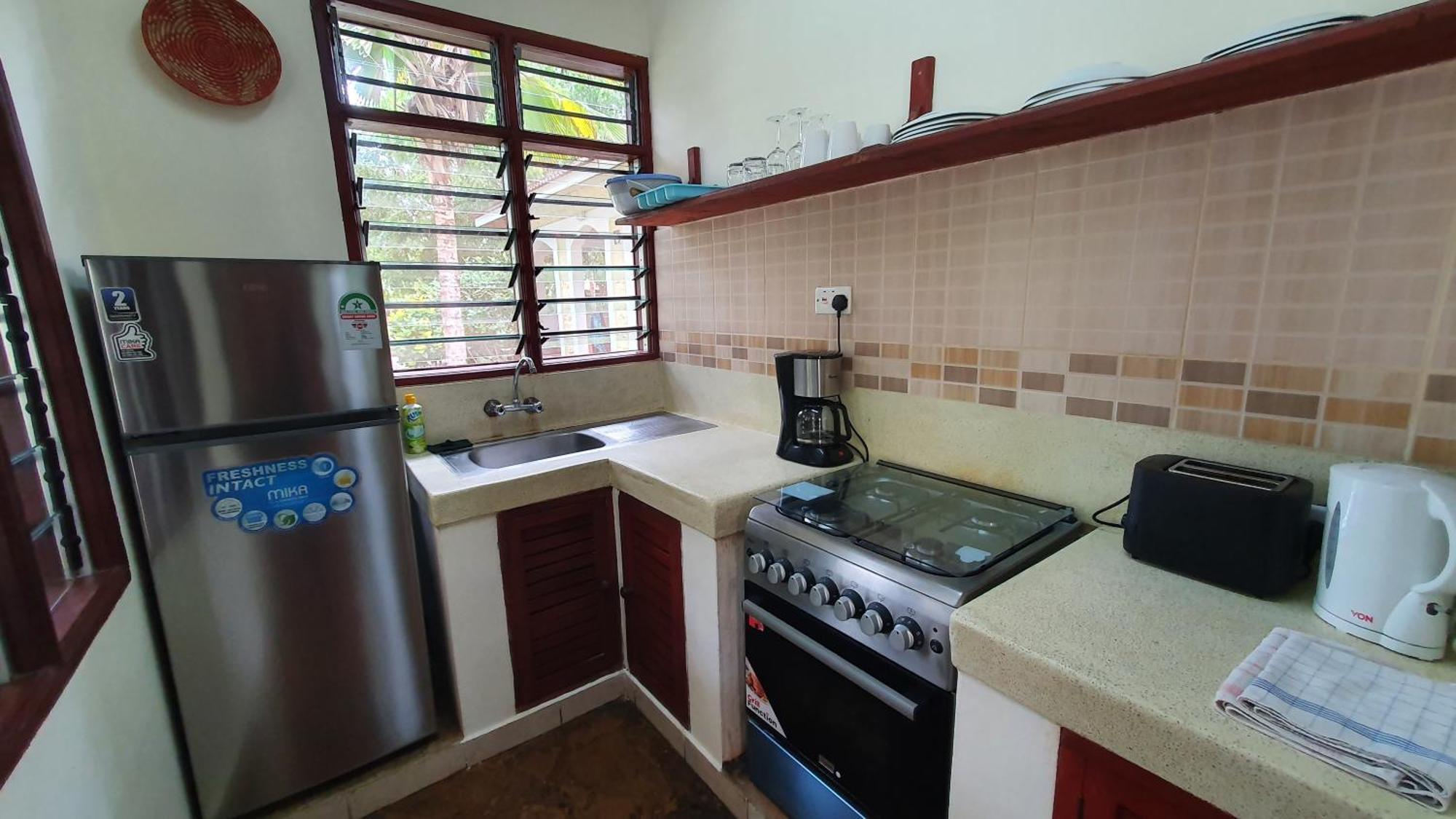 Safina Cottages Praia de Diani Exterior foto